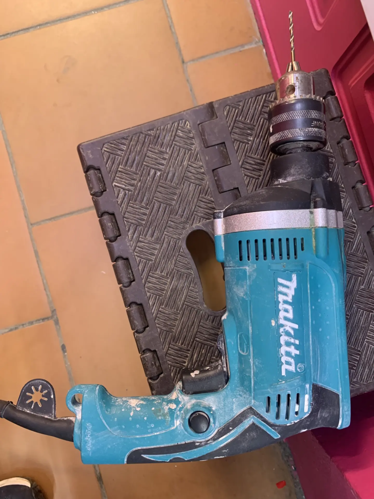 Дрель  Makita HP1630